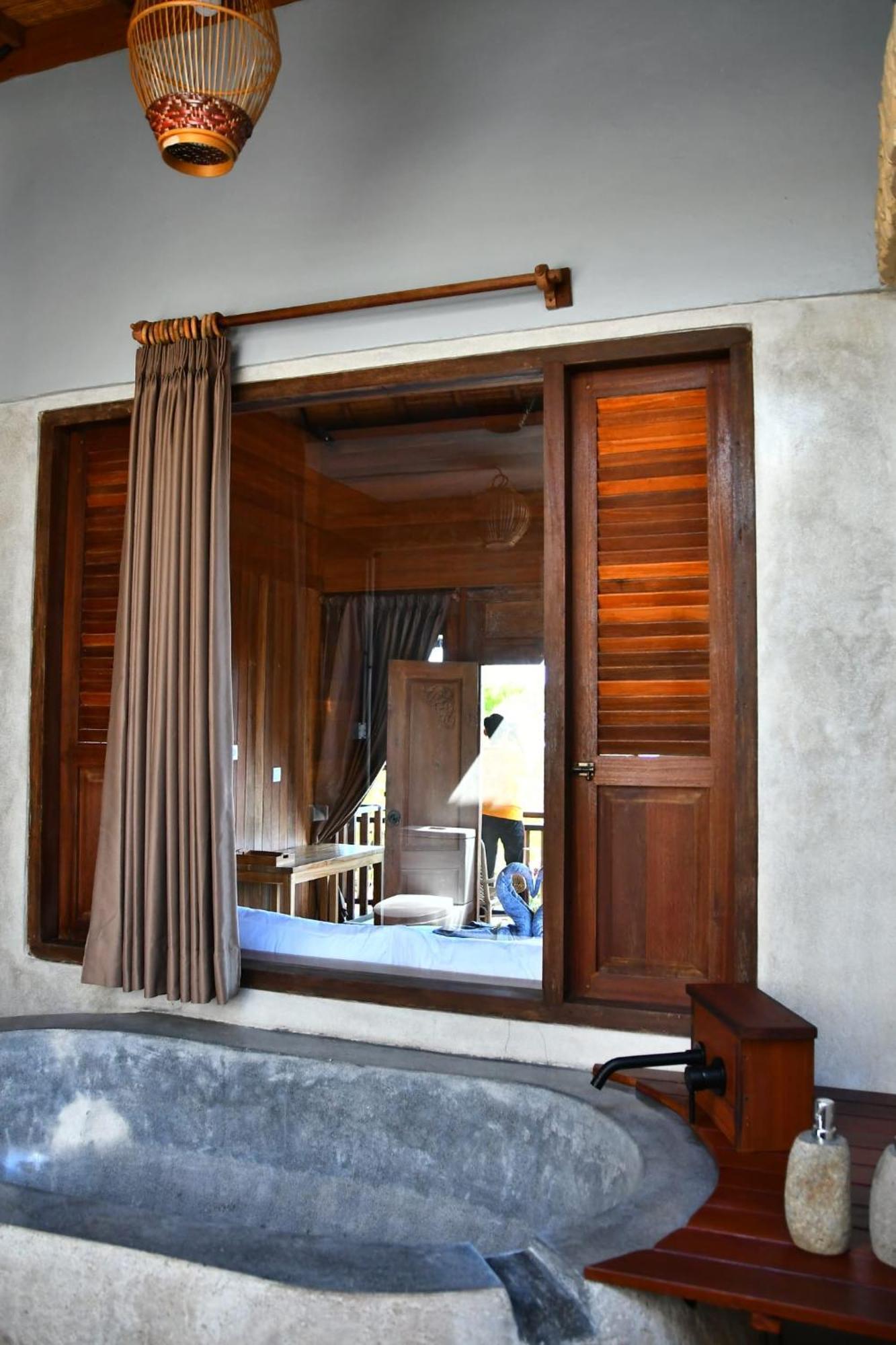 Putra'Lebah Amed Guest House المظهر الخارجي الصورة
