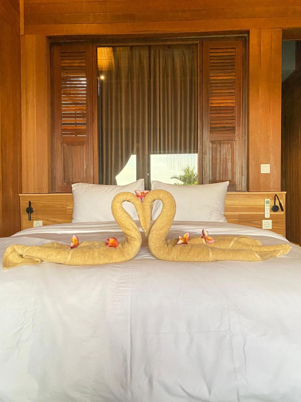 Putra'Lebah Amed Guest House المظهر الخارجي الصورة